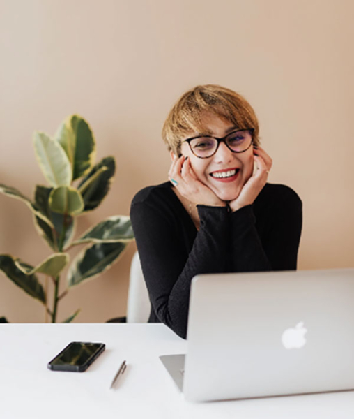 Woman in front of laptop